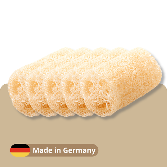 Five natural loofah sponge loops arranged in a row on a beige background with a 'Made in Germany' badge at the bottom left.